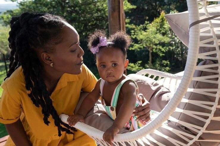 Nanny engaged in one-on-one child development activity
